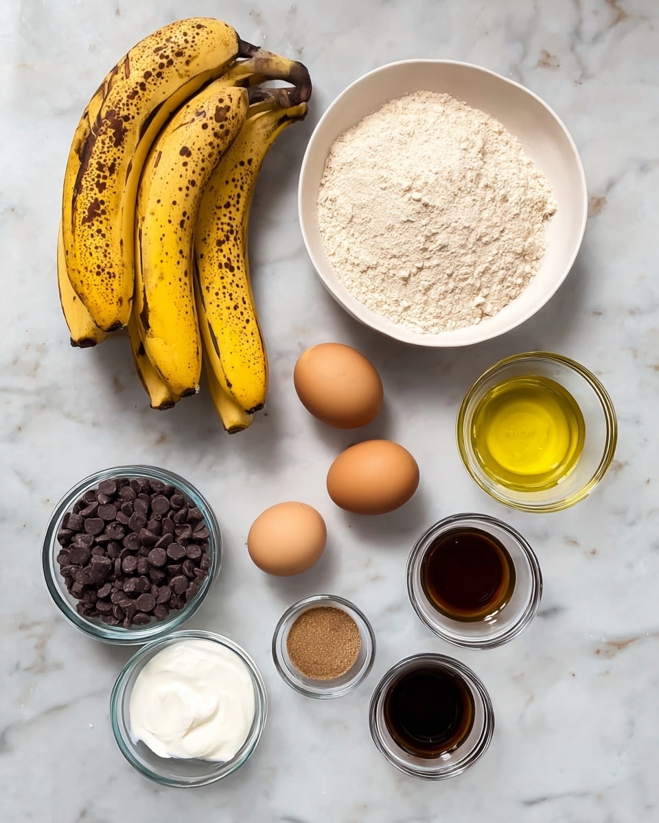 A white marbled surface holds several baking ingredients arranged neatly: a bunch of three ripe bananas with brown spots on the top left; a white bowl filled with light beige flour on the top right; below and slightly left is a small glass bowl with light brown sugar; two brown eggs sit side by side centered below the flour; to the right of the eggs is a small glass bowl with golden yellow oil; below the sugar bowl is a small glass bowl of white yogurt; nearby to the right are three tiny white dishes containing white salt, dark brown vanilla extract, and another white powder; at the bottom left is a glass jar filled with small dark chocolate chips. photo taken with an iphone --ar 4:5 --v 7