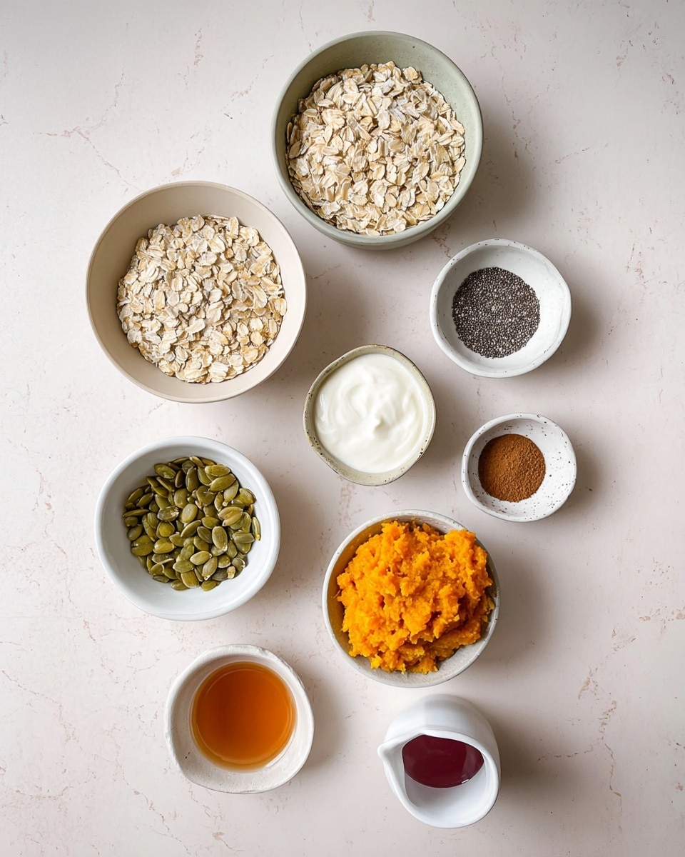 The image shows nine white bowls and small white containers arranged on a white marbled surface, each holding different ingredients. Starting from the top left, a larger bowl is filled with flat, pale tan rolled oats. To the right, a smaller bowl holds tiny black and white chia seeds. Next, a bowl is filled with smooth white yogurt. Below that, a bowl contains a bright orange mashed substance resembling cooked pumpkin or sweet potato. Below the oats and to the left, a bowl contains green pumpkin seeds. Near the center left, two small bowls hold brown powder, one slightly darker and more finely ground than the other. At the bottom, there is a small white jug with amber-colored liquid and next to it a smaller white container holding a dark reddish liquid. The bowls and containers are arranged neatly and spaced evenly on the surface. Photo taken with an iphone --ar 4:5 --v 7