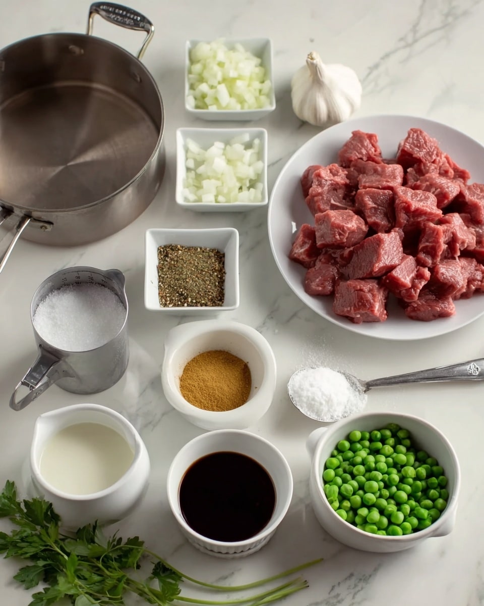 The image shows various ingredients arranged neatly on a white marbled surface. In the top right, there is a white plate filled with raw red beef chunks. To the left, a metallic pot with a thick base sits empty. Below the pot, a small white bowl contains diced white onions. Next to it, a square white bowl holds a mix of brown and green spices. In front of these, a metal measuring cup is filled with cream or milk. A small round metal bowl contains a yellow powder, placed near the center. To the right, a white cup is filled with dark soy sauce, and next to it, a small white ramekin has a darker liquid inside. A white bowl on the right side holds green peas. At the bottom left, a whole garlic bulb and some fresh green herbs rest directly on the surface. A metal spoon with white powder, likely baking or corn starch, is placed near the peas. The setup is clean and well-organized, ready for cooking preparation photo taken with an iphone --ar 4:5 --v 7