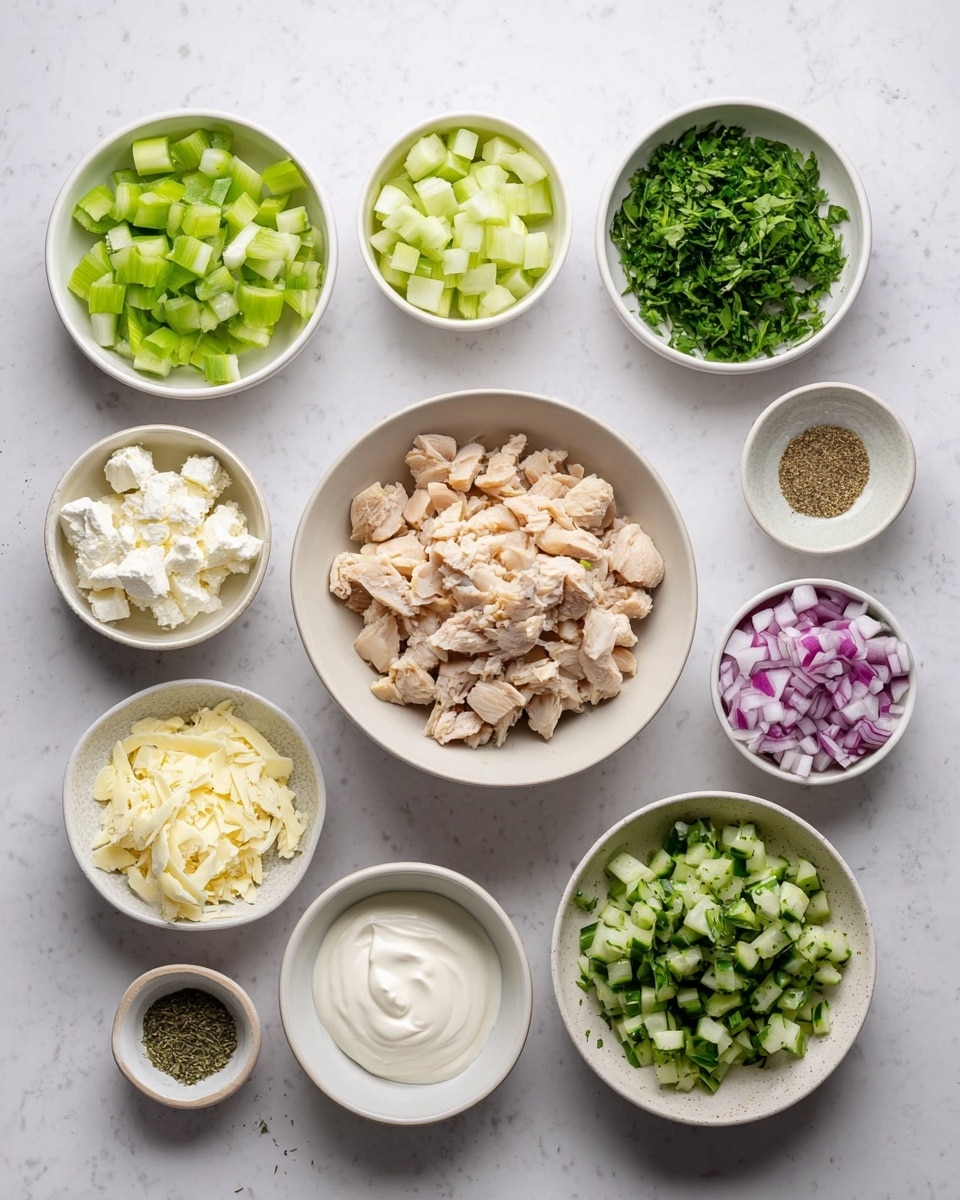 The image shows ingredients arranged neatly on a white marbled surface, ready for making a dish. In the center is a white bowl filled with chopped light brown cooked chicken. Surrounding it are smaller white bowls containing different ingredients: chopped green celery, chopped green cucumber, crumbled white cheese, a smooth off-white creamy yogurt, finely chopped green parsley, finely grated pale yellow garlic, ground black pepper, and finely chopped purple-red onions. On the bottom right is a white bowl with finely grated cucumber mixed with herbs. Each ingredient is bright and fresh, clearly separated with clean edges. Photo taken with an iphone --ar 4:5 --v 7