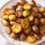 Garlicky Crispy Potatoes with All The Herbs Recipe