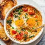 Baked Feta Eggs with Roasted Tomatoes and Vegetables Recipe