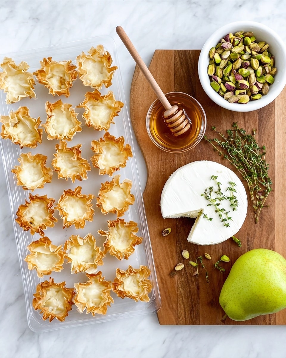 The image shows small tartlets arranged on a white plate with a black rim, placed on a white marbled surface. Each tartlet has a light golden-brown crispy shell with ruffled edges. Inside, there are layers of creamy white cheese, small chunks of light yellow pear with skin, and scattered pieces of green pistachios. Tiny green herbs are sprinkled on top, adding a fresh touch. Some pistachio pieces and herbs are also scattered around the tartlets on the plate. Photo taken with an iphone --ar 4:5 --v 7
