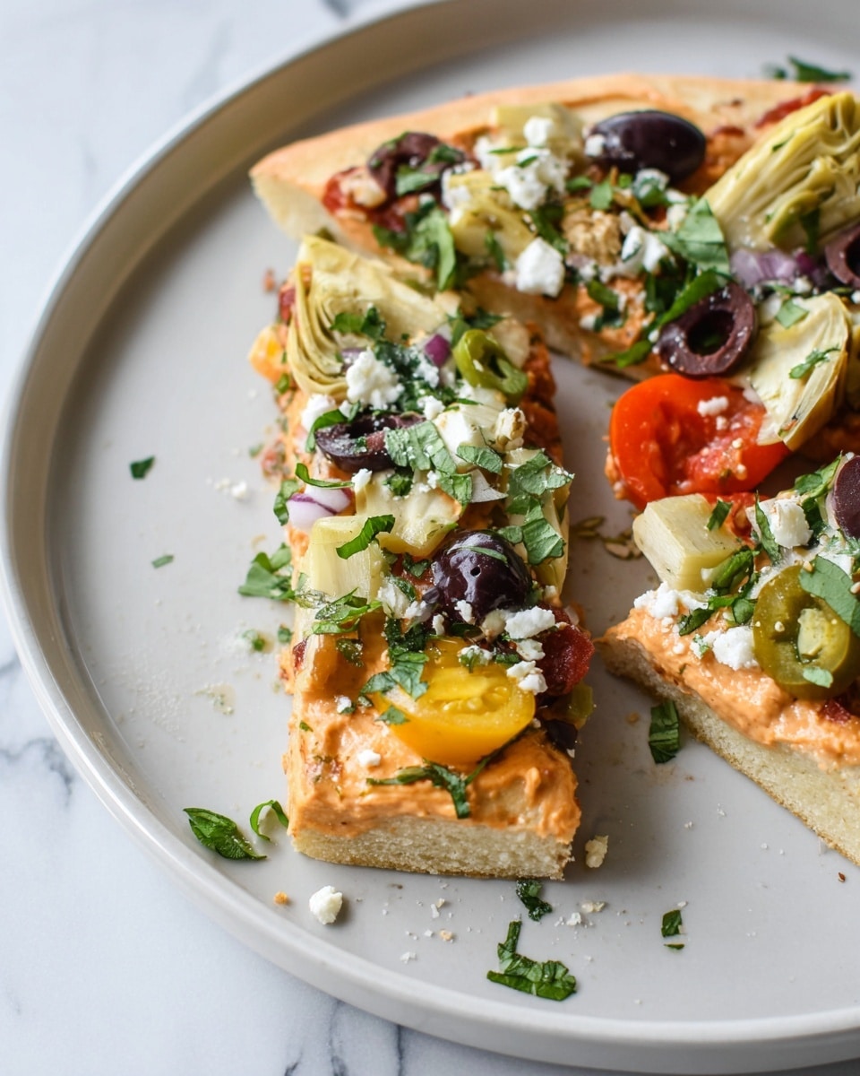 Two slices of pizza are on a white plate with a white marbled background. The pizza has two main layers: a thick, light golden crust at the bottom and a creamy orange sauce spread on top. Above this, there is a mix of colorful toppings including green herbs, sliced black and green olives, chopped tomatoes in red and yellow, artichoke pieces in pale yellow, and small white crumbles of cheese all scattered over the surface. The pizza looks fresh with a mix of soft and crunchy textures. Photo taken with an iphone --ar 4:5 --v 7