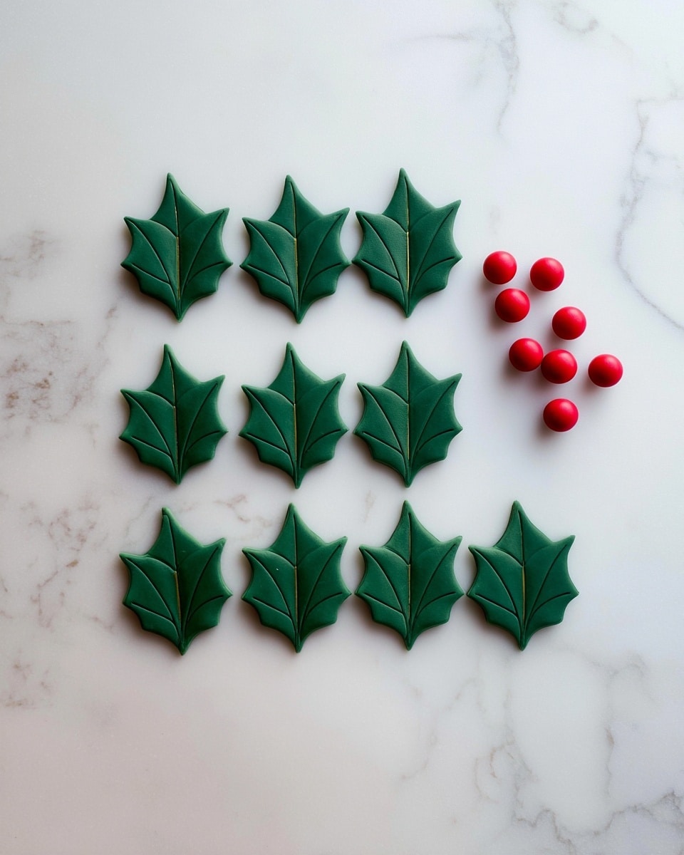The image shows thirteen dark green holly-shaped leaves made of a smooth material spread out on a white marbled textured surface in a diamond shape. Each leaf has pointed edges and a line down the middle to show the leaf's vein. To the right of the leaves, there are five small, round, shiny red balls arranged in a small cluster. The scene is simple and clean with a festive feel. photo taken with an iphone --ar 4:5 --v 7