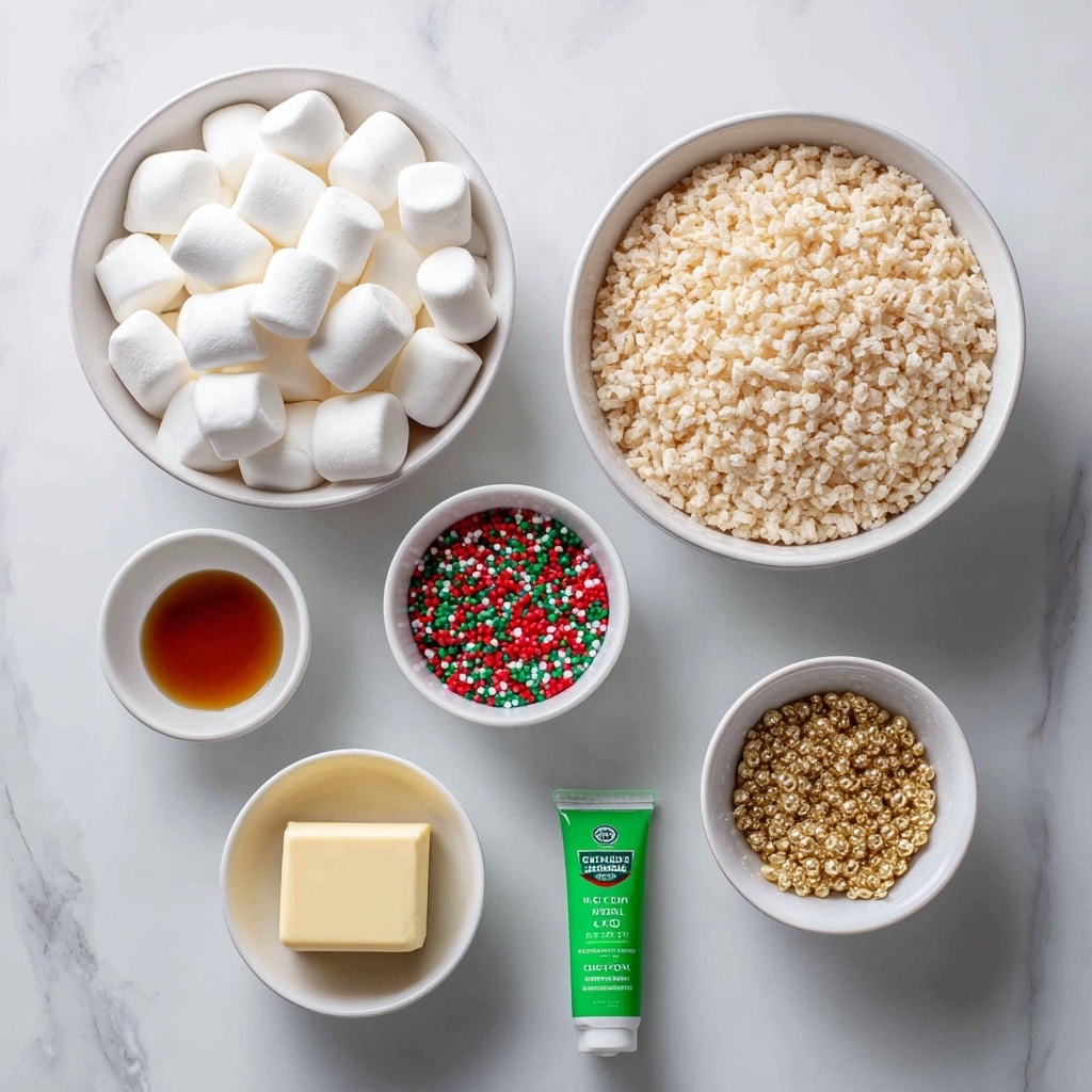 The image shows six ingredients arranged neatly on a white marbled surface. In the center left is a white bowl filled with large, smooth, white marshmallows. To the right of it, there is a white bowl filled with light beige Rice Krispies cereal, showing a crunchy texture. Above the marshmallows is a small white bowl with colorful sprinkles in red, green, and gold balls and sticks. Below and to the right of the marshmallows is a white bowl with a small block of light yellow butter. Near the butter on the top right side is a small green tube labeled green gel food coloring. At the bottom left corner, there is a tiny white bowl with a small amount of light brown vanilla extract. The text labels each ingredient clearly. The overall color scheme is soft with white bowls and bright pops of color from the sprinkles and green tube. Photo taken with an iphone --ar 4:5 --v 7