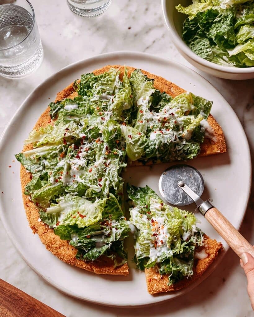 Viral Chicken Crust Caesar Salad Pizza Recipe