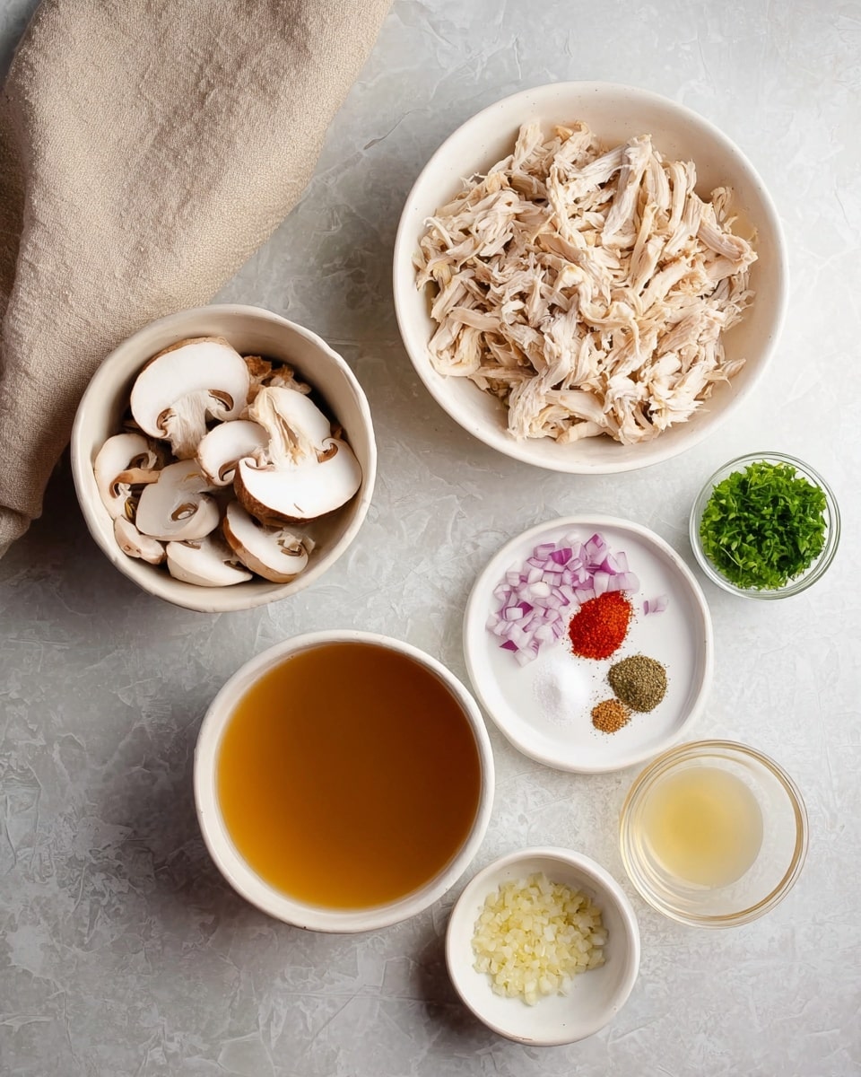 The image shows seven bowls arranged on a white marbled surface with a light beige cloth on the top left. The largest bowl at the bottom holds golden brown broth with a smooth surface. Above it, a white bowl is filled with light beige shredded cooked chicken. To the left, another white bowl contains sliced mushrooms with white and light brown tones. To the right is a small white bowl with chopped red and white onions. Below the onions is a round white plate holding four small piles of spices: bright red, white salt, dark pepper, and light green seasoning. Next to the spices is a tiny clear bowl with minced garlic, pale yellow in color. A small glass bowl with a few green parsley leaves is placed to the side, near the mushrooms. photo taken with an iphone --ar 4:5 --v 7