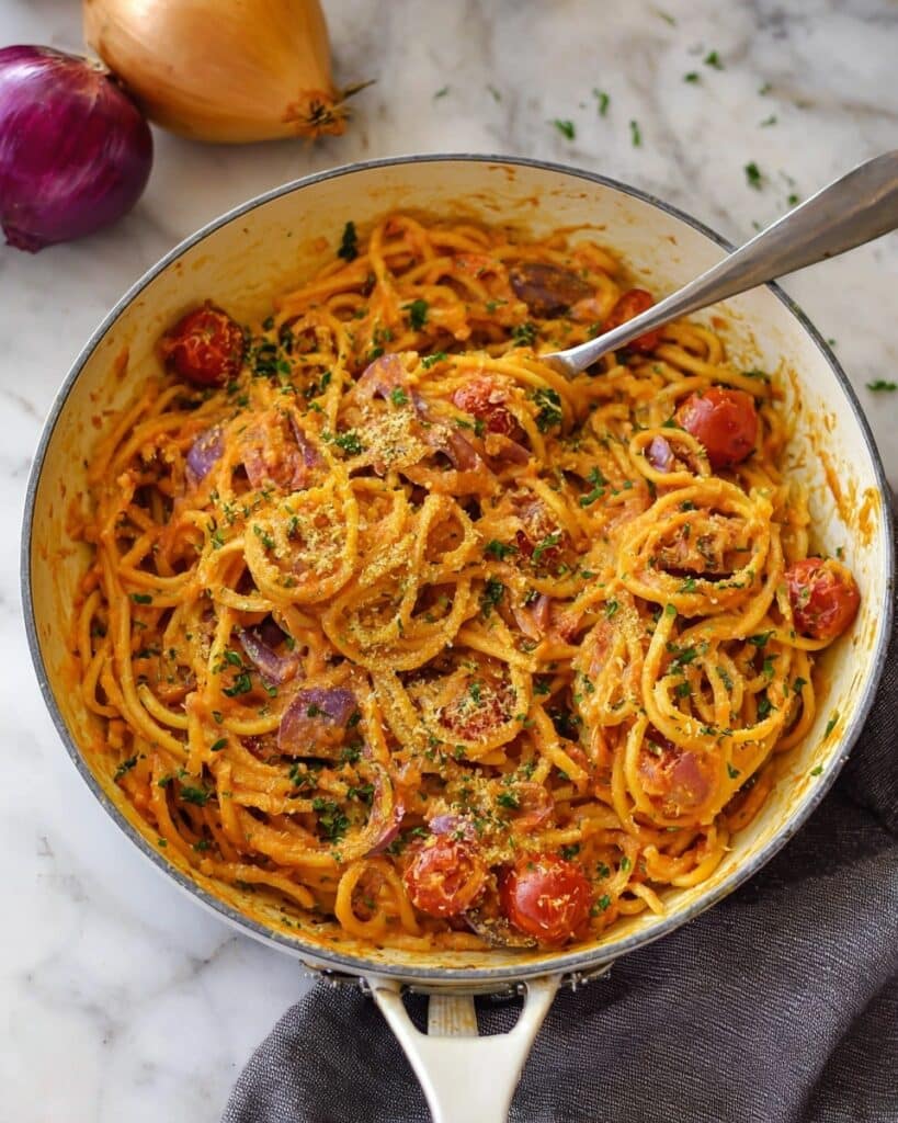 Creamy Onion Pasta with Tomatoes Recipe