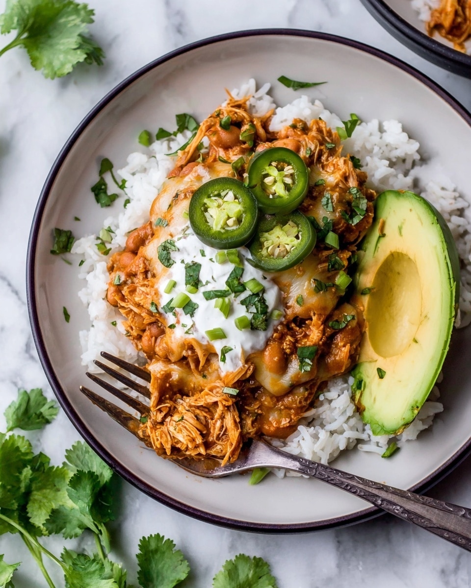 The image shows a black slow cooker filled with five pieces of raw pale pink chicken placed on top of an orange creamy sauce that has many small, dark beans scattered throughout. The sauce layer underneath is smooth and thick with a rich, warm color. The slow cooker sits on a white marbled surface. photo taken with an iphone --ar 4:5 --v 7