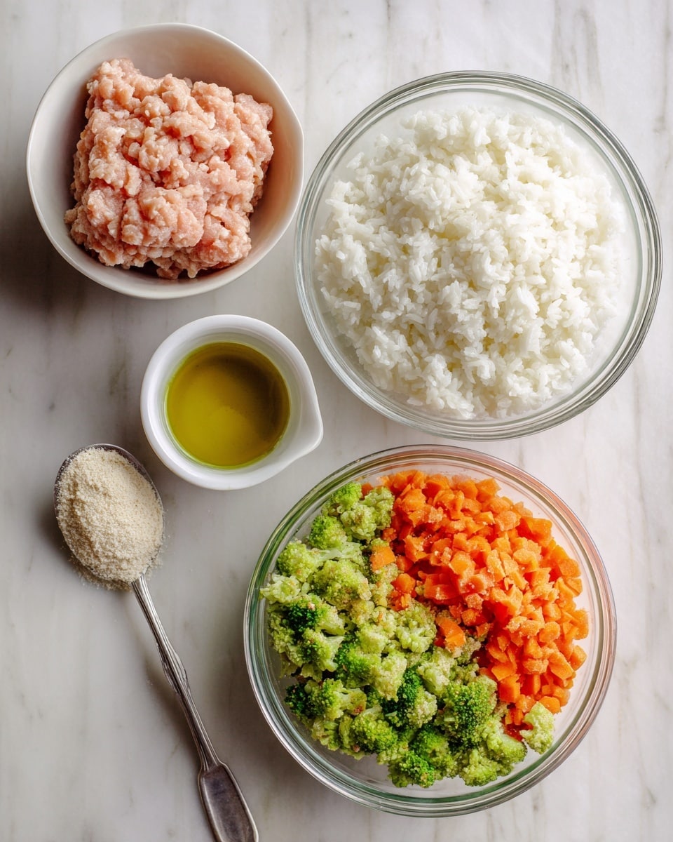 A white bowl holds a block of pale pink ground turkey with a soft texture. Below it is a clear glass bowl filled with white steamed rice that looks fluffy and sticky. Next to the rice is another clear glass bowl containing finely chopped broccoli and bright orange carrots, mixed together with a crumbly texture. To the left of these bowls is a small silver spoon with a heap of pale garlic powder, and below the spoon is a small white container filled with golden sesame oil. The items are placed on a white marbled surface. photo taken with an iphone --ar 4:5 --v 7