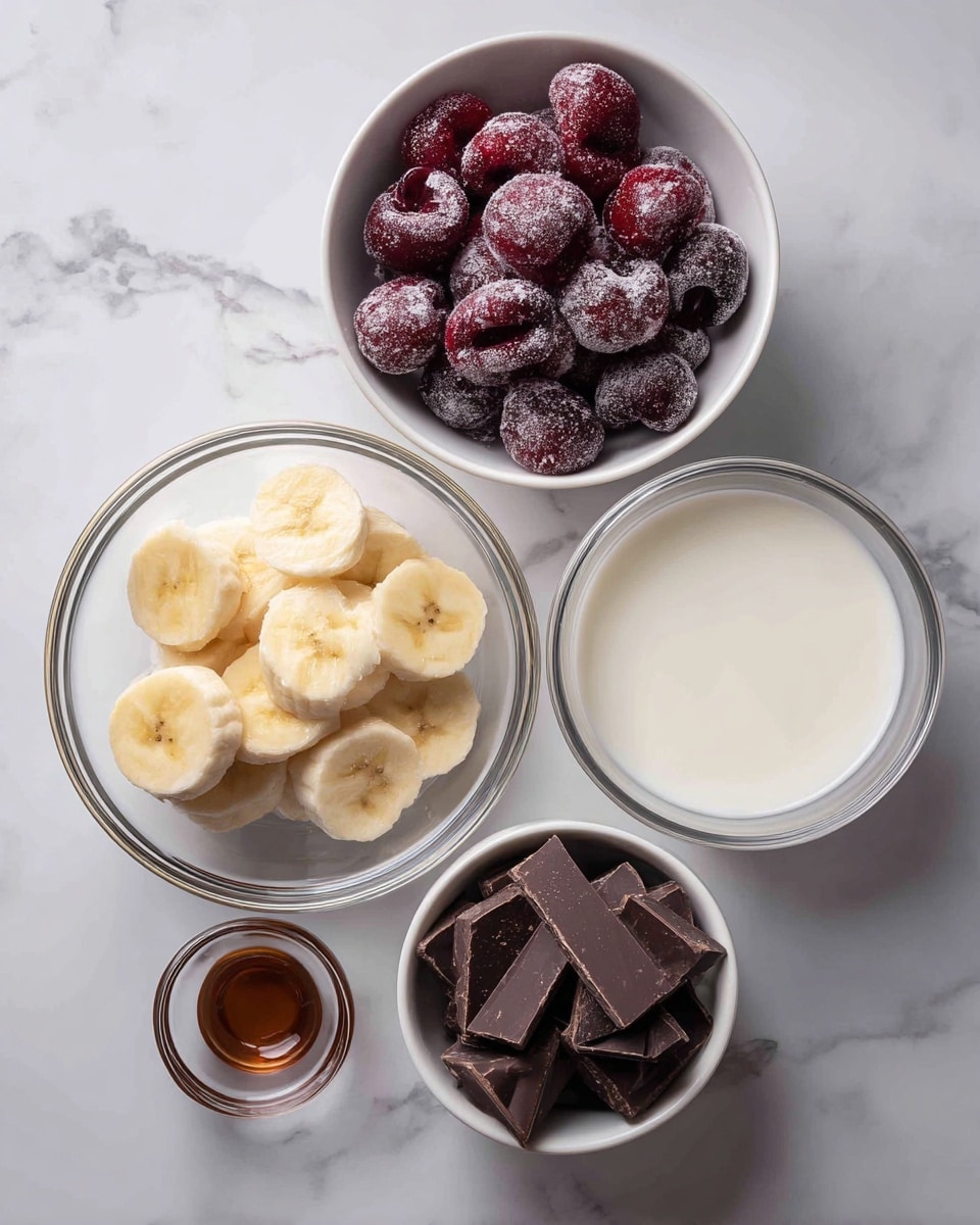 The image shows five white bowls with different ingredients placed on a white marbled surface. At the top, a bowl is full of dark red frozen cherries with a frosty texture. Below it to the left, a clear glass bowl holds slices of frozen bananas that are pale yellow with slight brown spots. To the right of the banana bowl, a clear glass bowl contains smooth, white coconut milk. Below the banana bowl, a small clear glass bowl has a small amount of brown vanilla extract. To the right of the vanilla, another white bowl holds broken pieces of dark chocolate, which are deep brown and slightly shiny. Each ingredient is labeled with black text above or beside it. Photo taken with an iphone --ar 4:5 --v 7