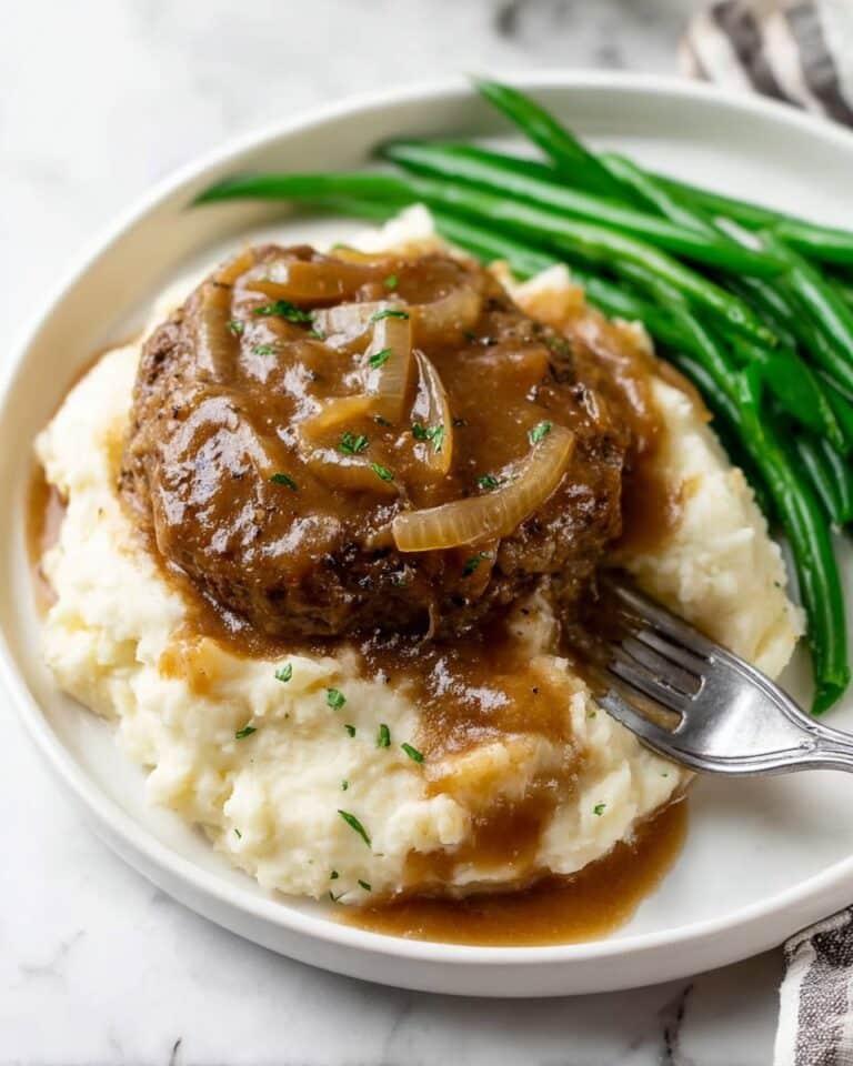 Tender Cube Steak in Rich Brown Gravy with Caramelized Onions Recipe