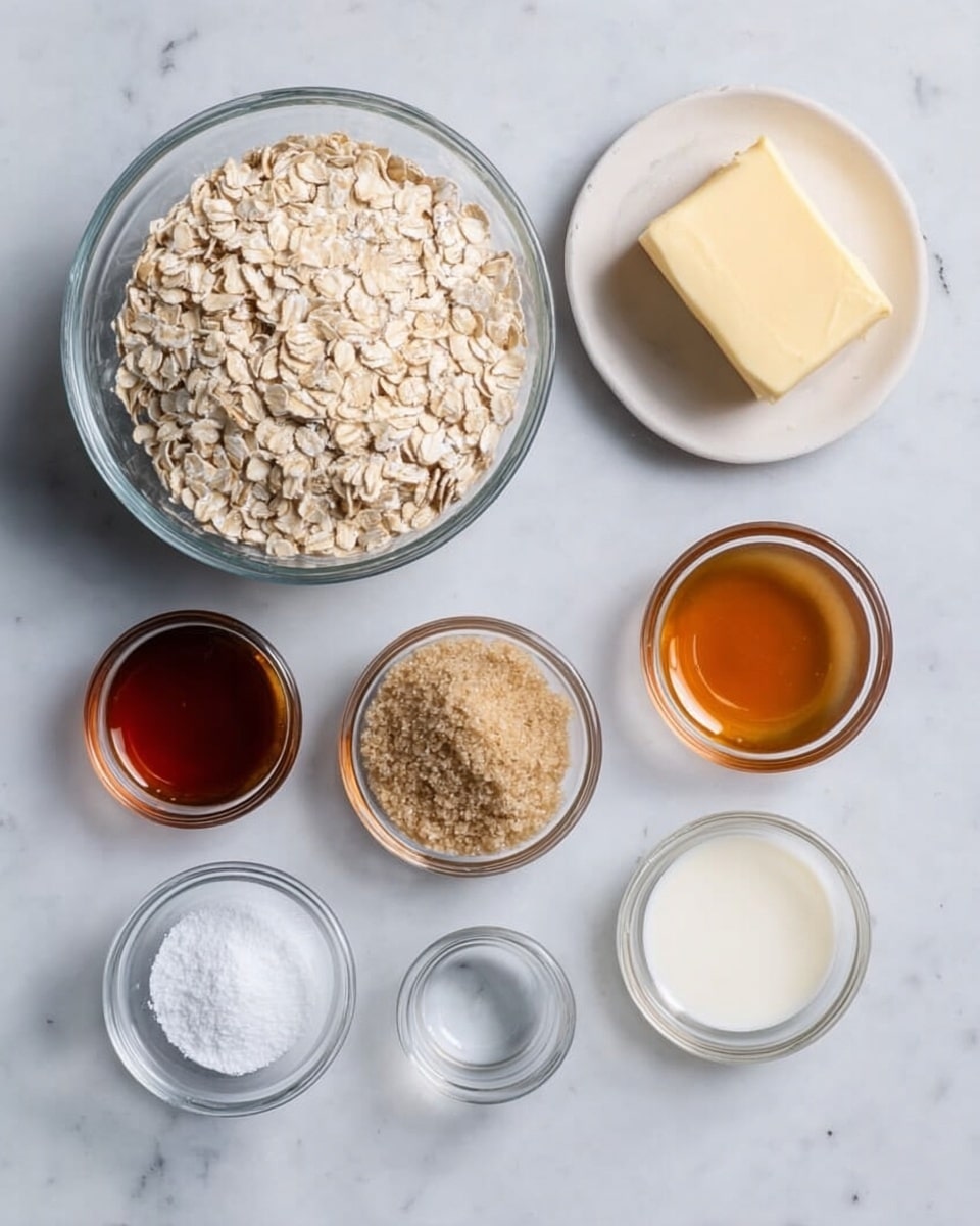 A top view of seven small glass bowls and a white plate arranged on a white marbled surface. Starting from the top left, there is a large glass bowl filled with light beige rolled oats. To its right, a white plate holds a stick of pale yellow butter. Next to the butter, a small glass bowl has a light amber liquid, likely vanilla extract. Below the butter and vanilla, a medium glass bowl contains white granulated sugar, while to its left, a similar bowl is filled with golden brown sugar. Just below the brown sugar, a small bowl holds dark amber honey or syrup. The arrangement is neat, and the colors range from beige, yellow, and white to various shades of brown and amber, showing raw ingredients for baking or cooking. Photo taken with an iphone --ar 4:5 --v 7