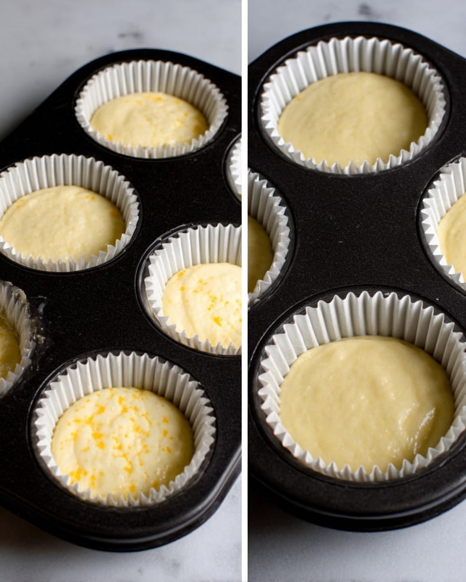 The image shows a black muffin pan with six white paper liners filled with smooth, light yellow batter that has a thick and creamy texture. The left side shows the entire pan with all six cups filled evenly, while the right side zooms in on two of the cups revealing small yellow specks within the batter. The paper liners have soft, ridged edges, and the pan rests on a white marbled surface. The batter’s surface is slightly uneven but smooth overall, showing it is ready to bake. Photo taken with an iphone --ar 4:5 --v 7