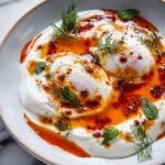 Turkish Eggs (Cilbir) with Herbed Yogurt and Spiced Butter Recipe