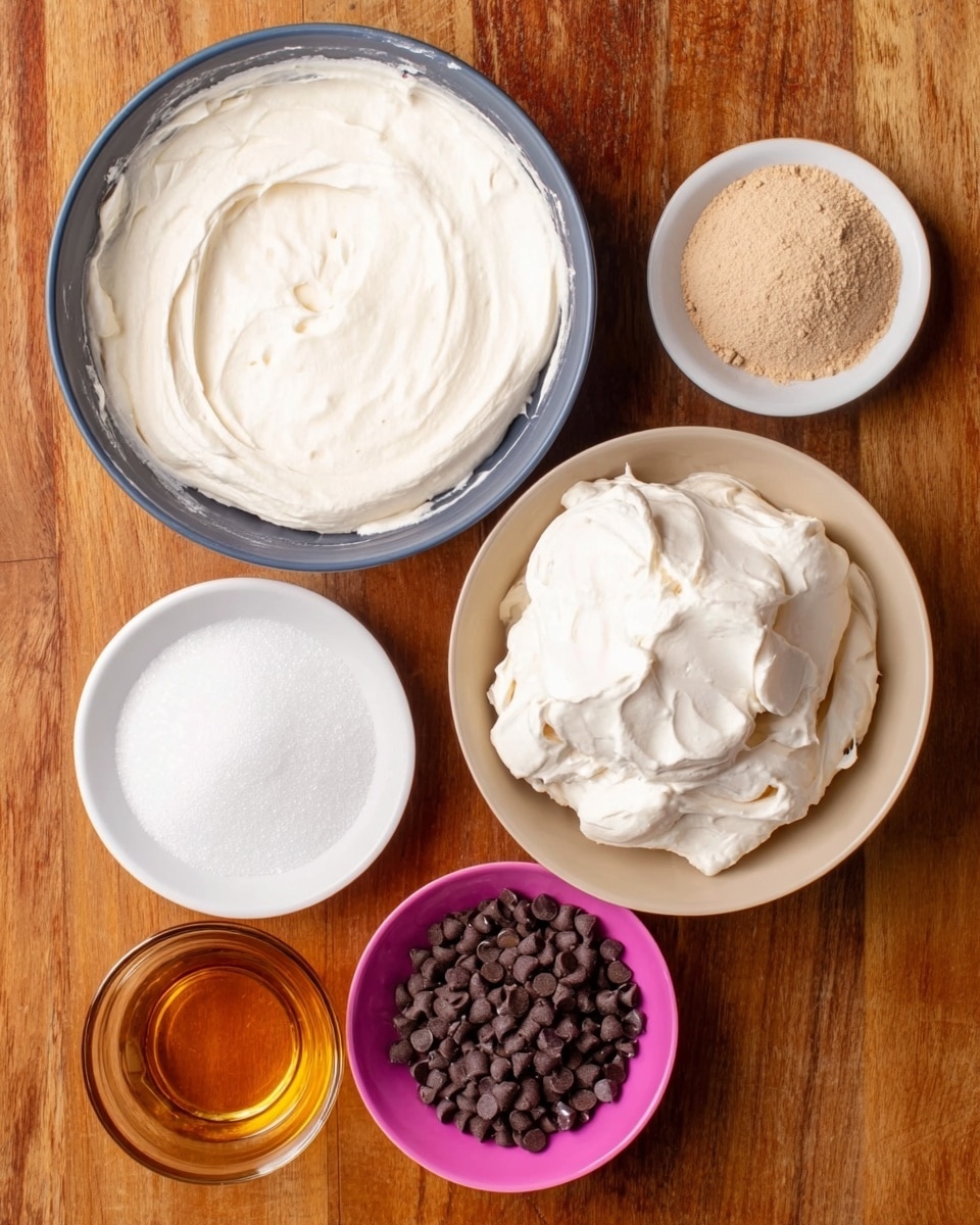 A round metal baking pan inside an oven on a metal rack, holding a light cream-colored batter topped with many small dark chocolate chips spread evenly across the surface. The pan is placed on the middle rack and the oven door is open, showing the batter ready to bake with a smooth texture under the chips. The metal sides of the pan are visible and reflect light, while the oven interior has a dark, slightly shiny look. The overall scene is captured with soft natural light on a white marbled surface background. photo taken with an iphone --ar 4:5 --v 7