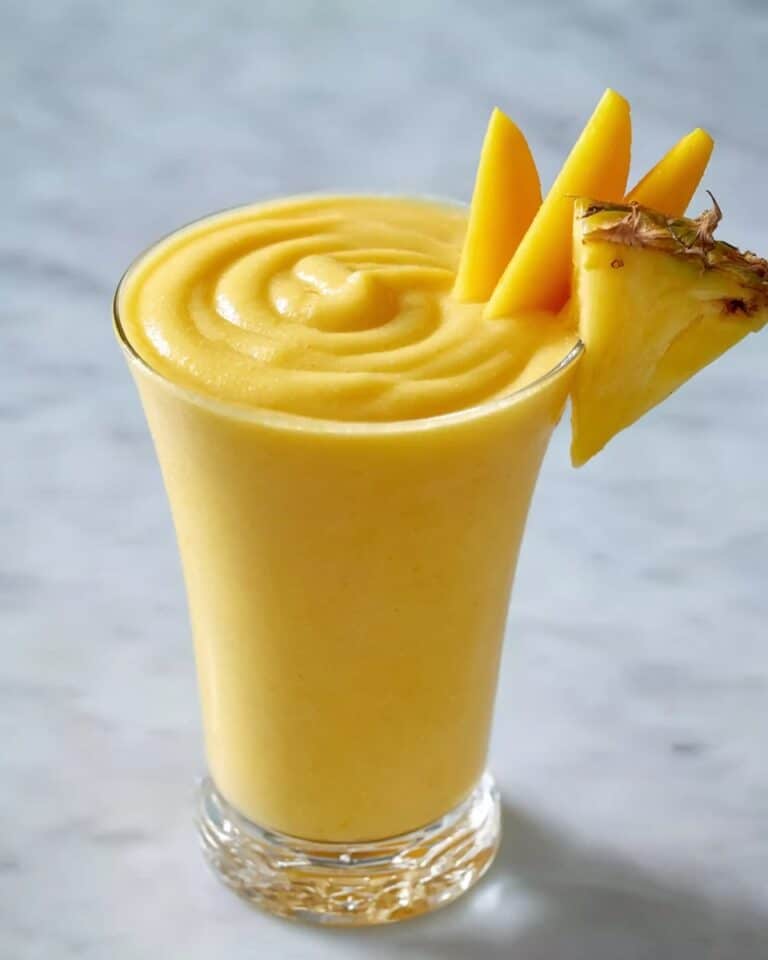 Refreshing Mango Pineapple Smoothie with a Tropical Twist Recipe