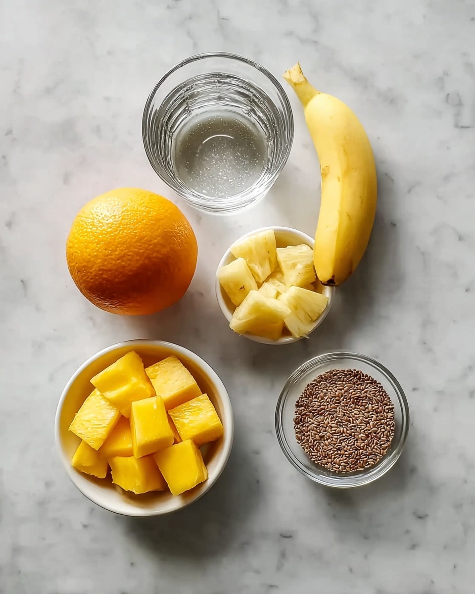 On a white marbled surface, ingredients are arranged in a neat grid: a small clear glass bowl filled with water at the top, below it a peeled, whole orange in the center, with a short peeled banana above the fruit, two white bowls side by side beneath the orange—one holds bright yellow mango cubes neatly scored, the other contains chunky pieces of pale yellow pineapple, and a small clear dish filled with brown flax seeds rests centered below the white bowls. Photo taken with an iphone --ar 4:5 --v 7
