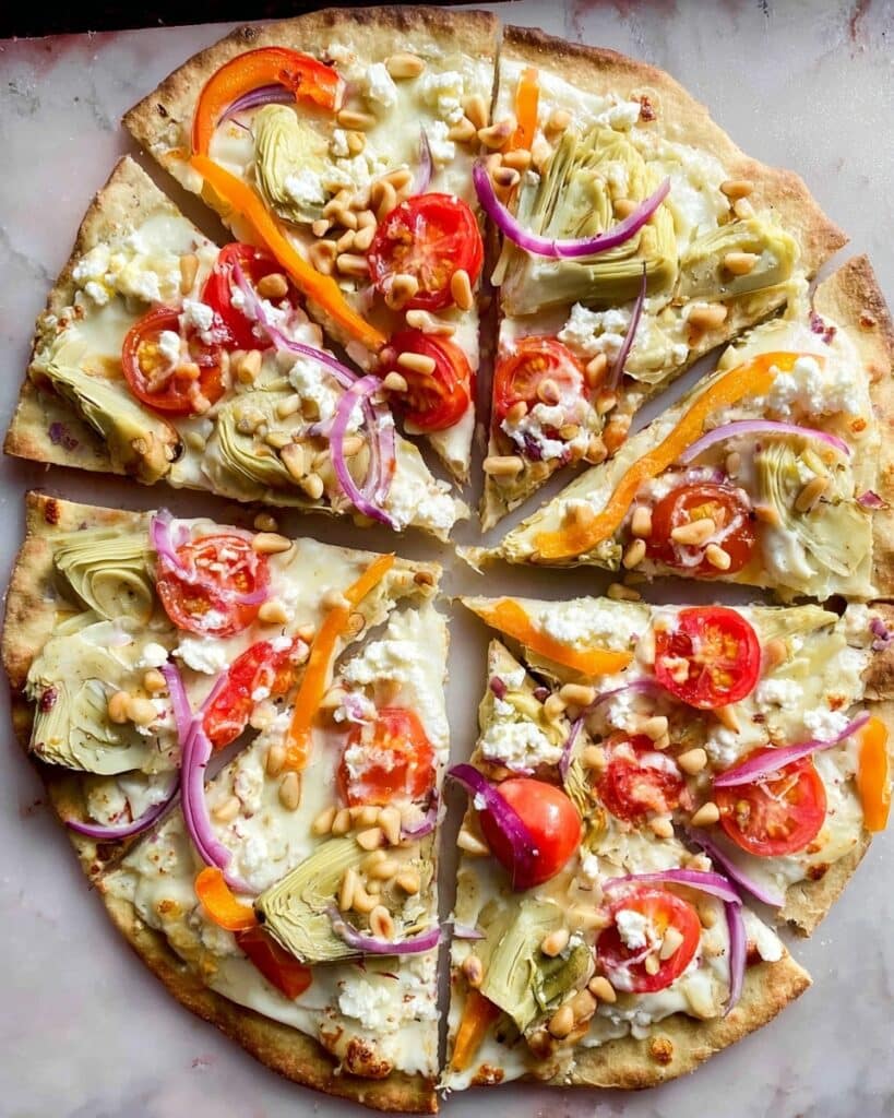 Mediterranean Pizza with Artichokes, Tomatoes, and Goat Cheese Recipe