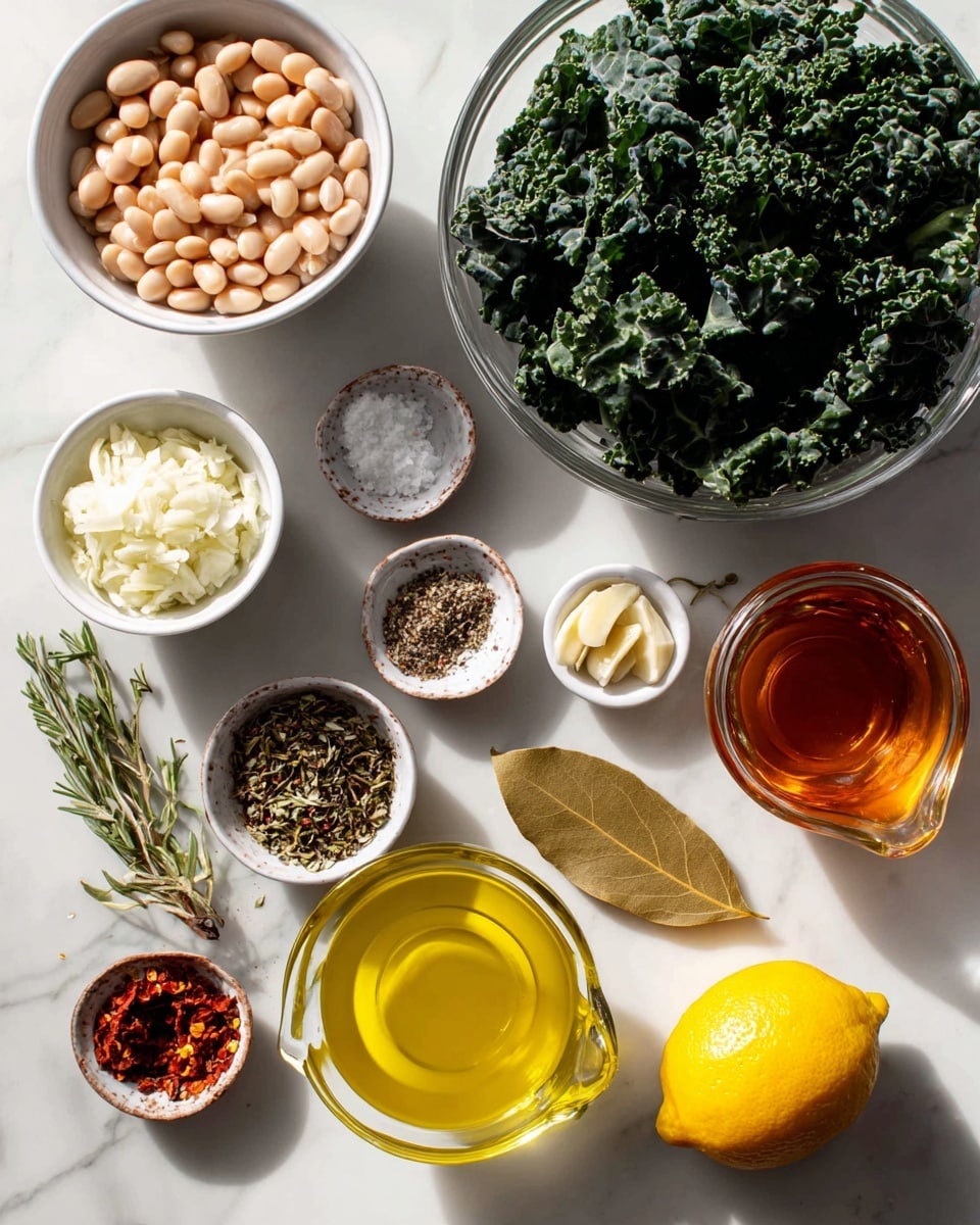 The image features a collection of fresh ingredients arranged on a white marbled surface. In the center, there is a clear glass bowl filled with dark green leafy kale. Surrounding it are smaller white bowls and glass measuring cups holding various ingredients: a measuring cup with light beige canned white beans, a white bowl with finely chopped white onion, a tiny white bowl with minced garlic, another small white bowl containing a mix of salt and black pepper, and a glass measuring cup filled with amber-colored vegetable stock. A small white bowl holds bright yellow olive oil, while two small brown bowls contain dried chili flakes and mixed dried thyme/rosemary herbs. A single fresh yellow lemon and a brown bay leaf rest on the surface, completing the arrangement. All items are neatly placed in an organized manner, with natural lighting highlighting the textures and colors photo taken with an iphone --ar 4:5 --v 7