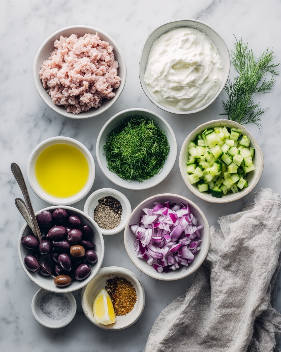 The image shows several small white bowls on a white marbled surface, each filled with different ingredients for cooking. At the top center is a bowl with light pink ground chicken, to the right is a bowl with smooth white coconut yogurt, and next to it a bowl with bright green chopped dill. Below these are a bowl of dark purple olives, a bowl of chopped red onion with shades of white and purple, and a bowl of small green cucumber pieces. There is a small bowl with yellow olive oil, a bowl with pale yellow lemon juice, a bowl with a mix of herbs and spices in light brown powder form, and a bowl with white salt and black pepper. A light gray linen cloth is placed on the right side of the frame. The overall layout is neat and bright with natural lighting. photo taken with an iphone --ar 4:5 --v 7