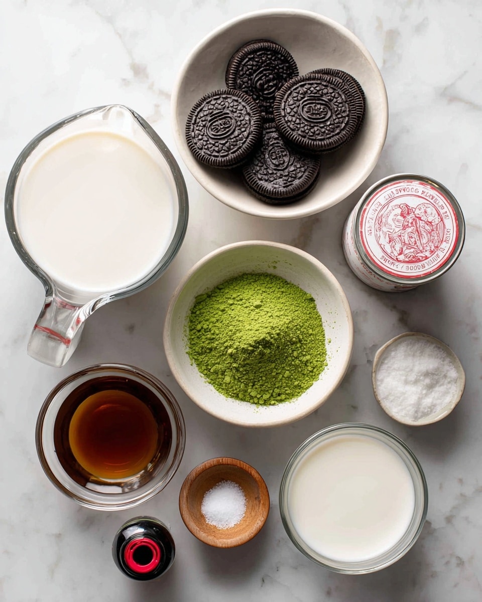 The image shows ingredients arranged on a white marbled surface. At the top center, a white bowl holds several dark chocolate sandwich cookies. To the right of it is a small can with a red and white label, identified as sweetened condensed milk. Below these, there is a small white bowl filled with bright green matcha powder. On the left side, a clear glass measuring cup contains white milk, and below it, a white bowl with a rich amber-colored liquid, likely vanilla extract. At the bottom left, there is a small dark bottle with a red cap, probably vanilla or another extract. At the center-right bottom, a small wooden bowl holds a pinch of white salt, and to the right, a small clear glass cup carries a small amount of white cream or milk. The ingredients are spaced evenly with clear visibility of each on the white marbled surface. photo taken with an iphone --ar 4:5 --v 7