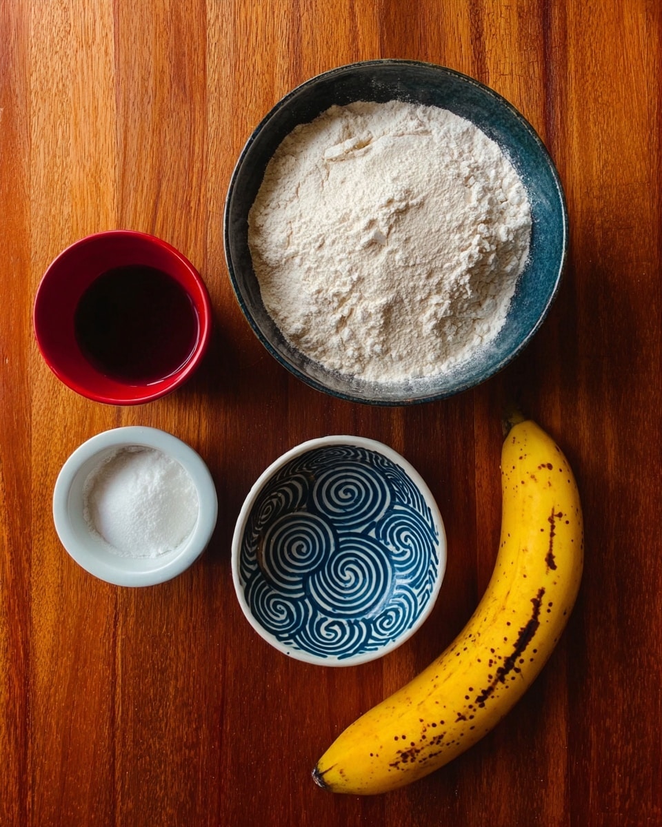 The image shows a top view of five items on a wooden table: a large bowl filled with white flour, a small white bowl with white spooned substance, a small red cup with dark liquid, an empty white bowl with blue spiral patterns, and a ripe yellow banana with brown spots positioned to the right. The bowls and cup are evenly spaced, creating a balanced layout. photo taken with an iphone --ar 4:5 --v 7