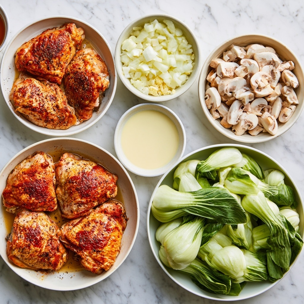 The image shows a white pan with six pieces of cooked chicken thighs, browned on top with a crispy texture, sitting in a creamy light brown sauce that fills the pan about halfway. Around the chicken, there are sliced mushrooms with a smooth, slightly glossy surface in a pale beige to light brown color. In one shot, several fresh green bok choy stalks with white thick stems and deep green leafy tops are in another white pan before cooking. In the final shot, the chicken pieces are nestled among cooked bok choy leaves and mushrooms in the creamy sauce, presenting a mix of textured crispy chicken, soft mushrooms, and tender green leafy vegetables all in the same pan, set on a white marbled surface. Photo taken with an iphone --ar 4:5 --v 7